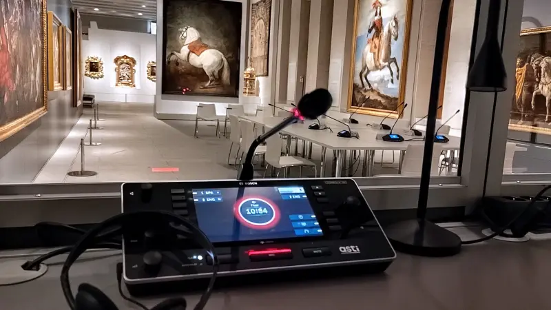 Meeting room with DICENTIS Discussion Devices on the table