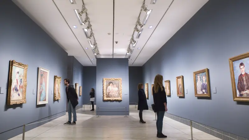 persons in an art museum