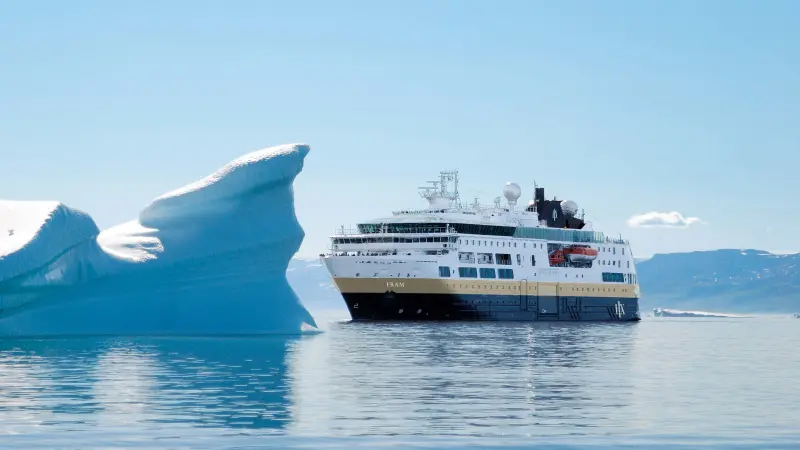 Cruise ship in front of an ice floe in Antarctica