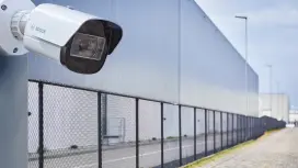 DINION 7100i IR camera with fence background
