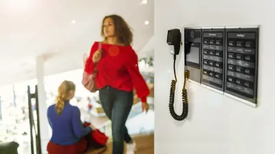 building the positive: woman in a building walking past the Preasensa Wall Mount Call Station with Extension