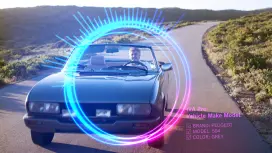 Footage of video analytics software that identifies the make and model of a car driving on a country road.