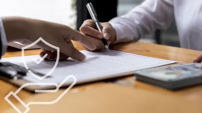 Close-up of hands signing a document, representing corporate governance, compliance, accountability, and transparent decision-making in business operations.